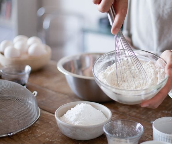 Combine all the egg-protein-almond butter powder-milk-creation medium-baking soda-vanilla-honey things in a giant bowl and whisk until smooth.